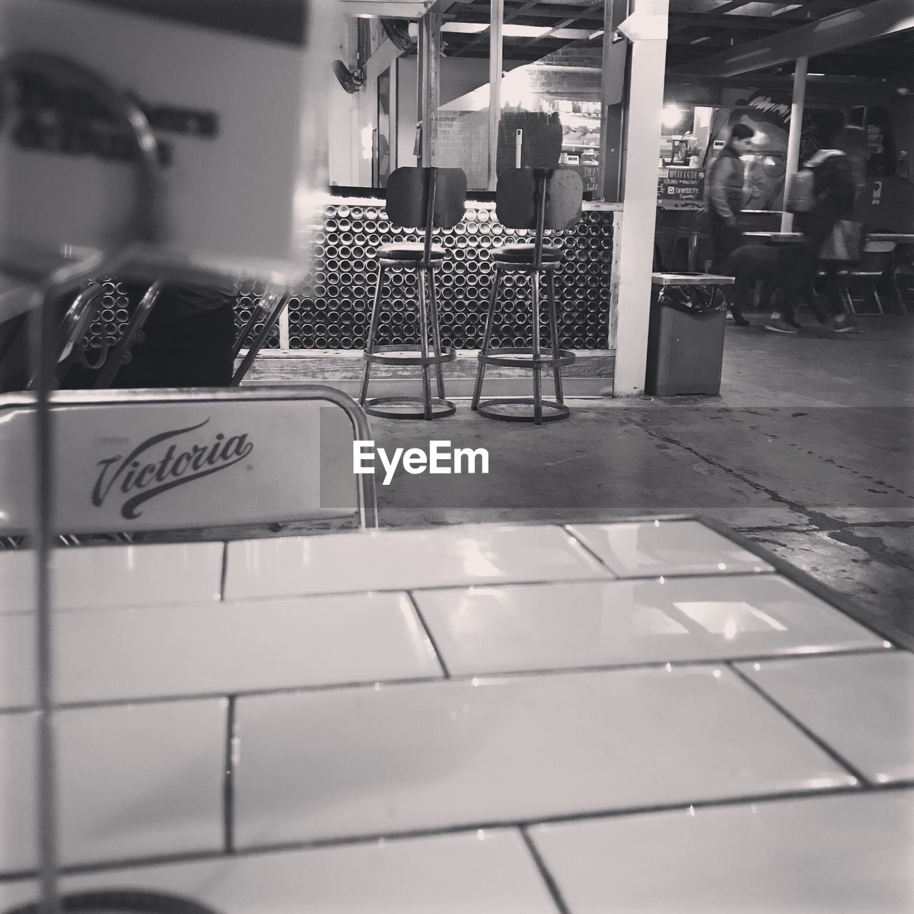 EMPTY CHAIRS AND TABLES IN RESTAURANT