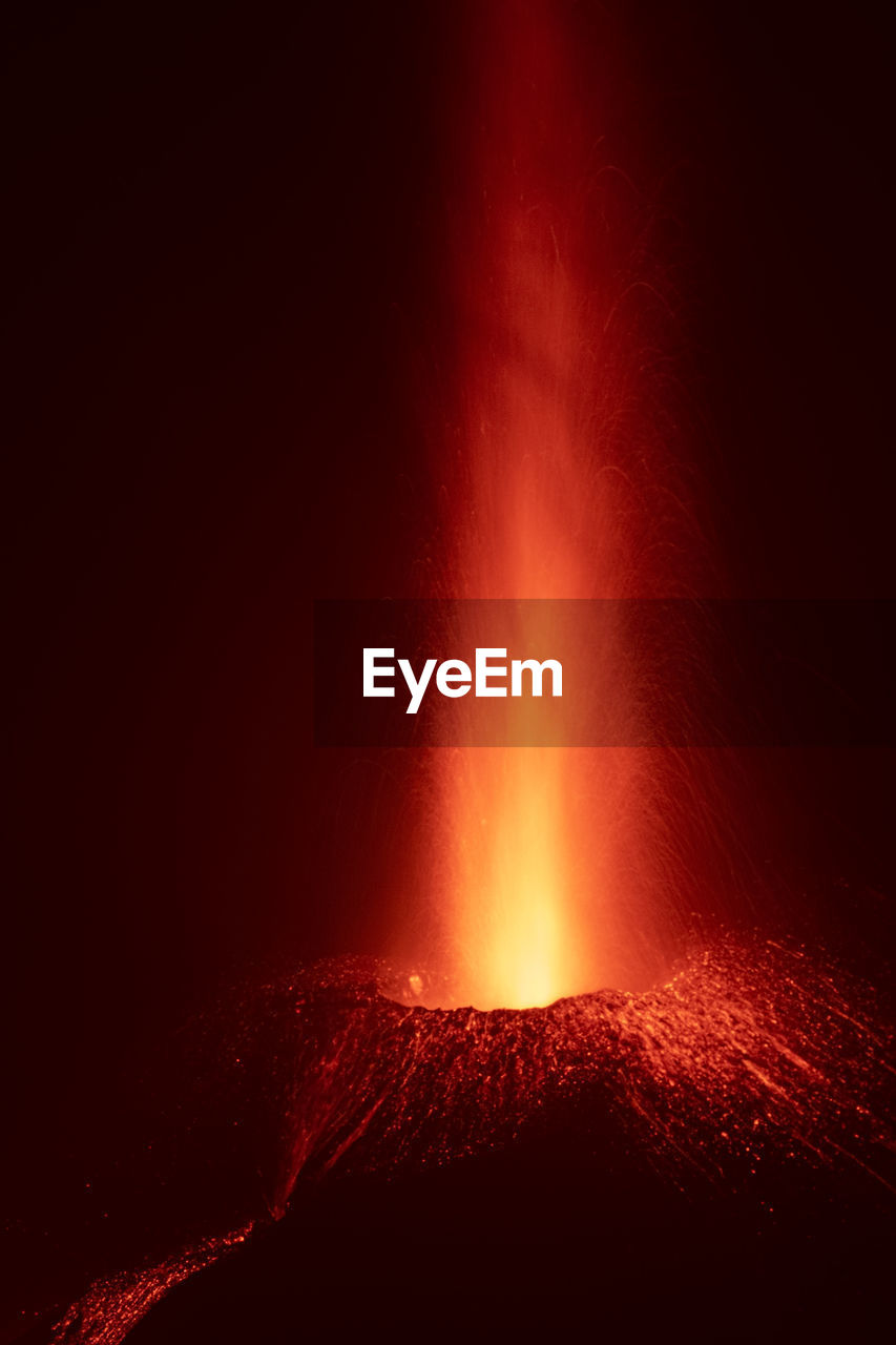 Powerful devastating eruption of cumbre vieja volcano at night in la palma island