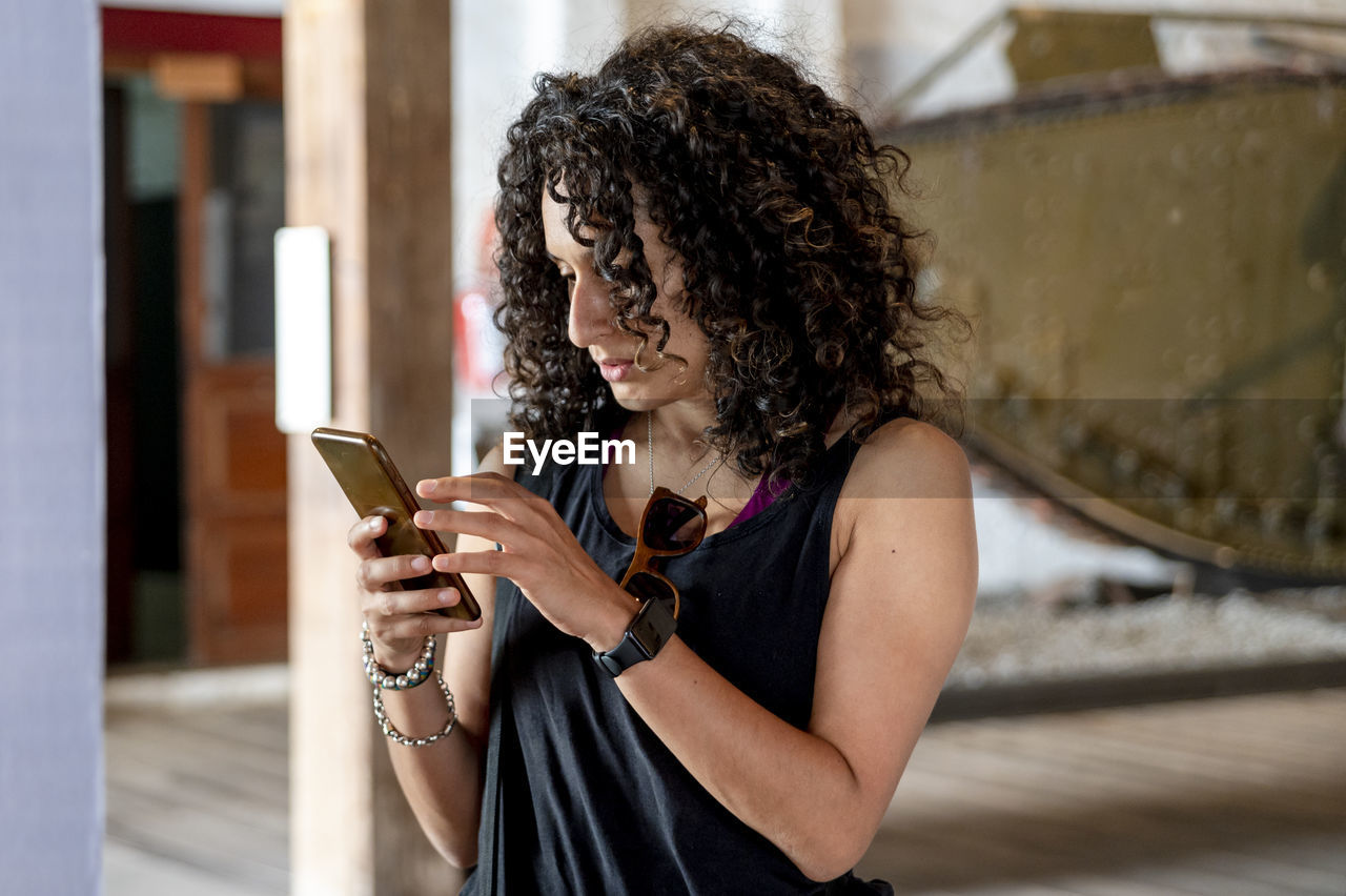 Woman using a mobile phone.