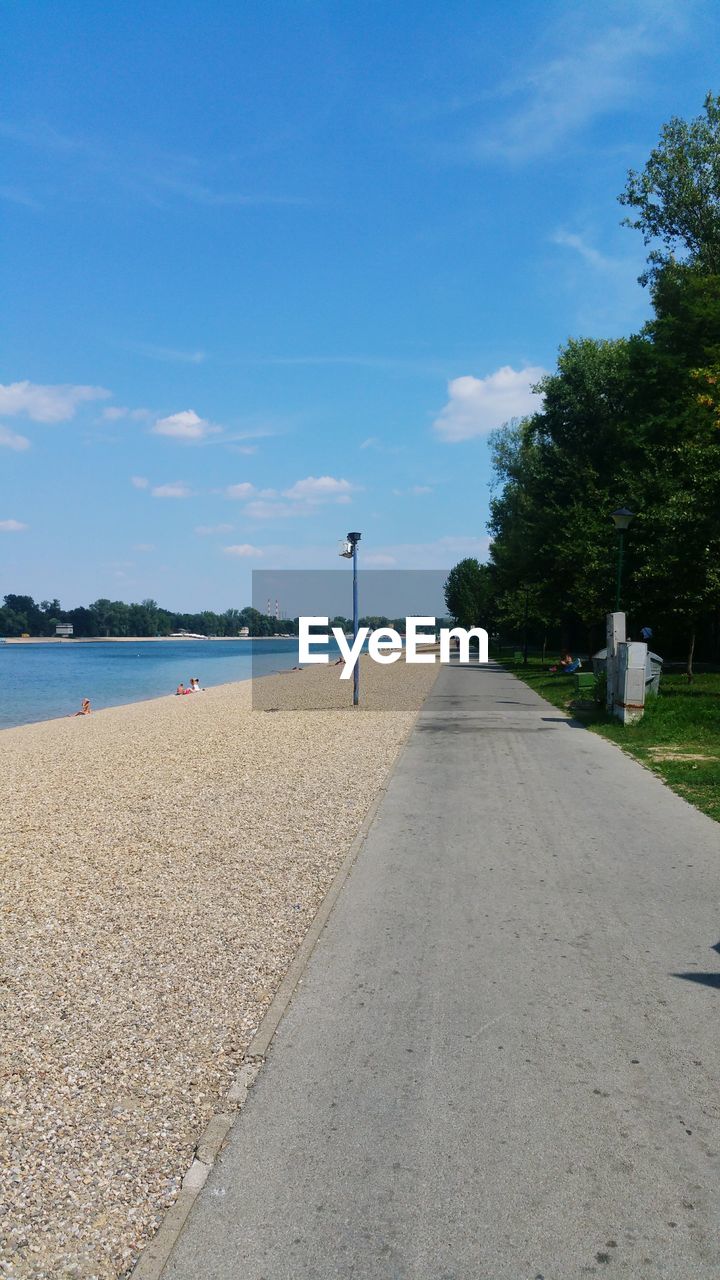 View of beach against blue sky