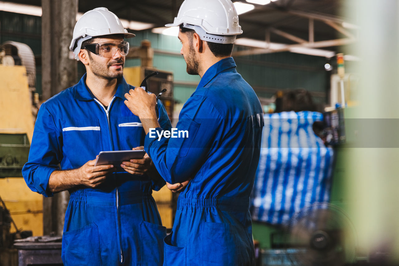 Manual workers working in factory