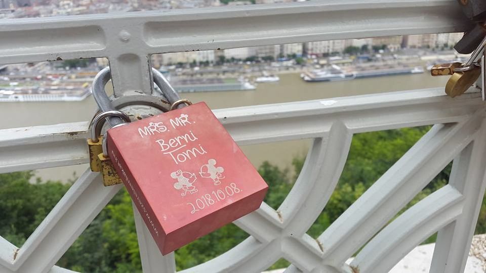 padlock, love, lock, positive emotion, railing, text, architecture, bridge, love lock, security, communication, protection, emotion, built structure, hanging, metal, day, heart shape, no people, luck, outdoors, travel destinations, city, tourism, hope, western script, travel, nature, close-up