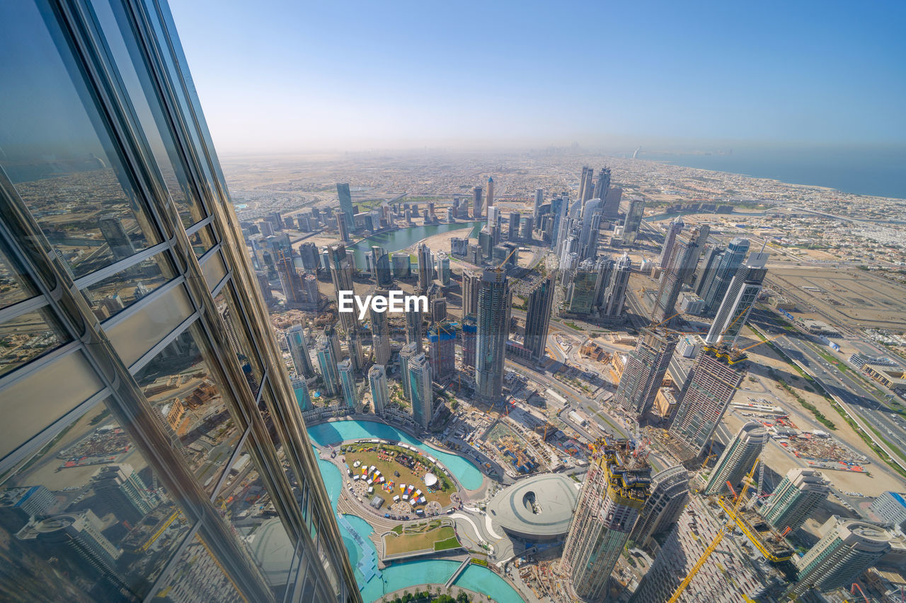 Cityscape seen from burj khalifa against clear sky