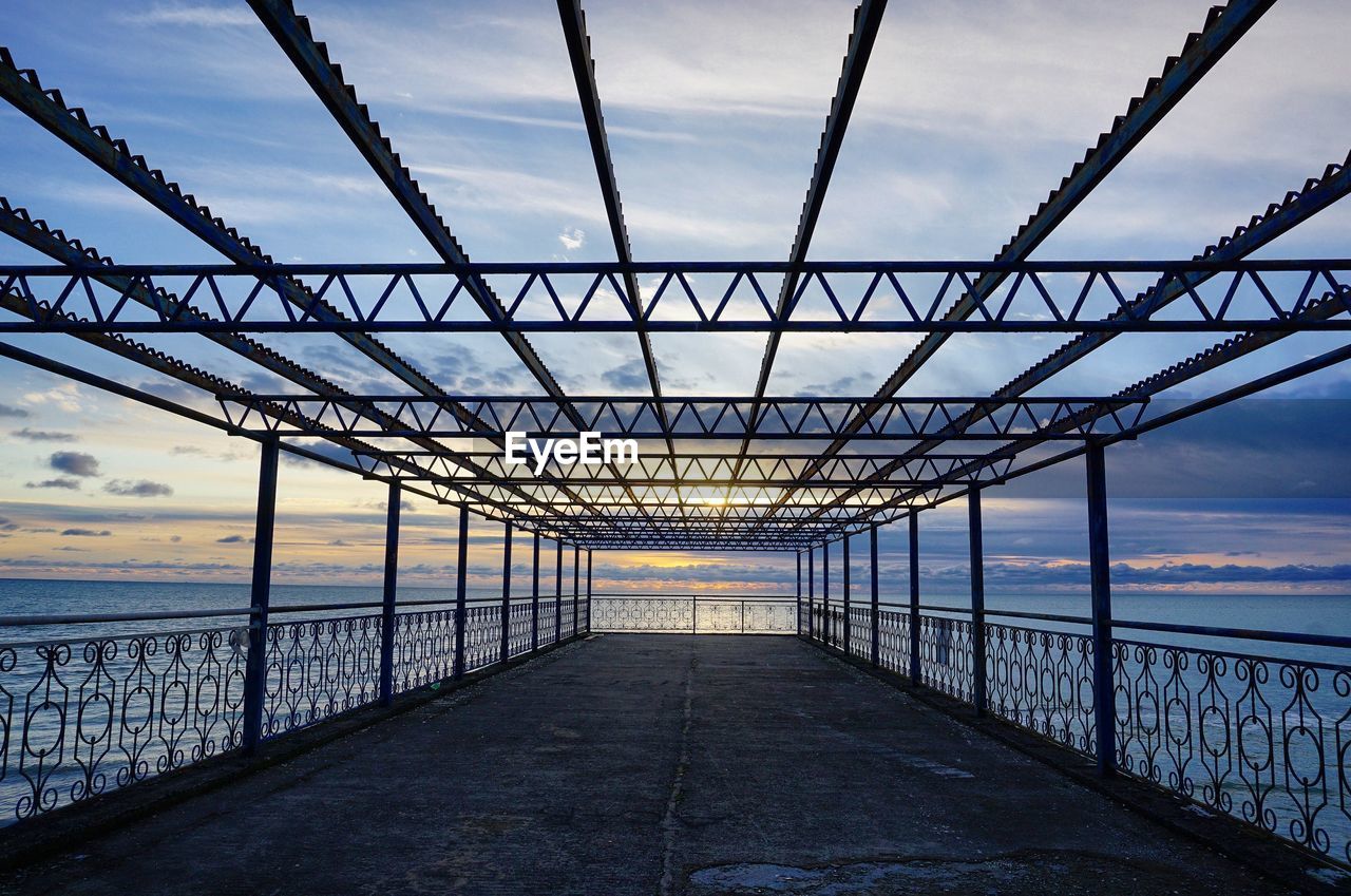 BRIDGE AGAINST SKY DURING SUNSET