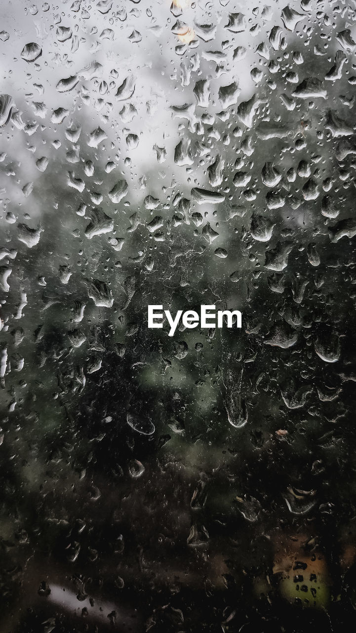 wet, rain, drop, water, window, glass, full frame, transparent, raindrop, rainy season, drizzle, backgrounds, no people, nature, indoors, monsoon, close-up, freezing, monochrome, car, mode of transportation, day, vehicle interior, motor vehicle, transportation, snow, reflection, leaf, black and white, land vehicle, car interior