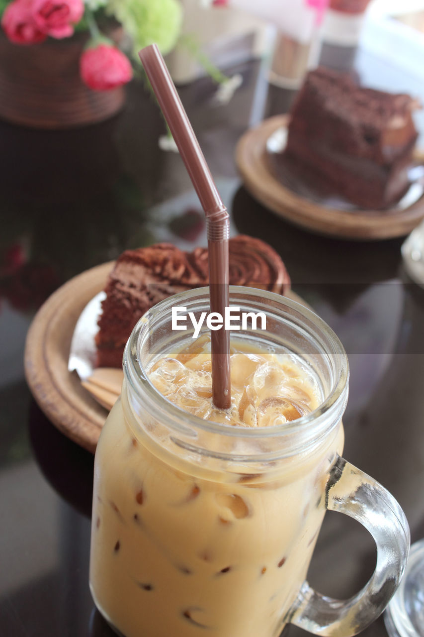 CLOSE-UP OF COFFEE ON TABLE