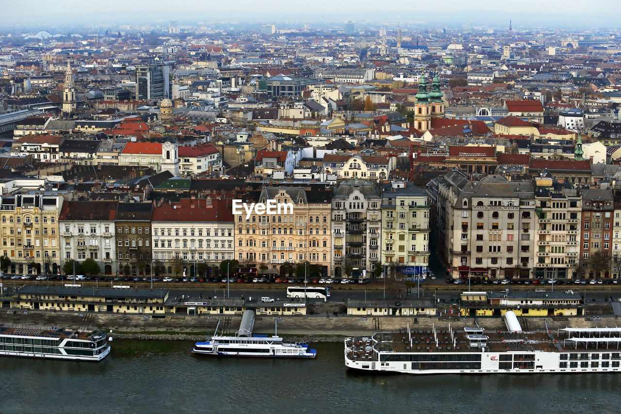 Aerial panorama on danube river boat and hungarian houses, budapest