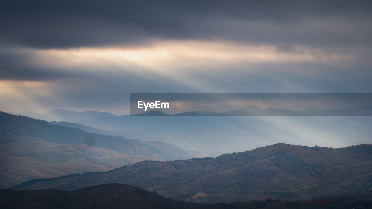 Scenic view of dramatic landscape against sky