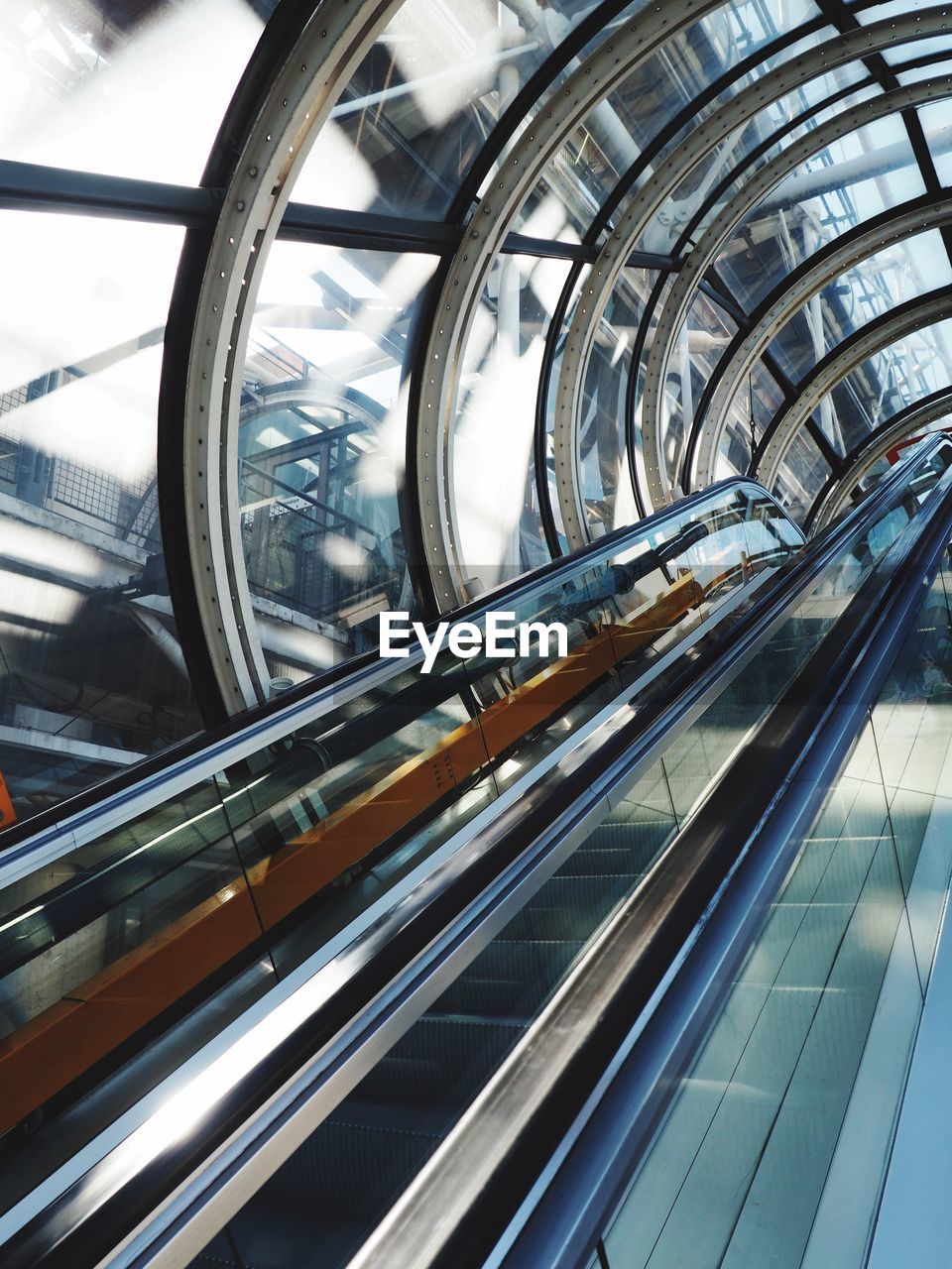 LOW ANGLE VIEW OF ESCALATORS