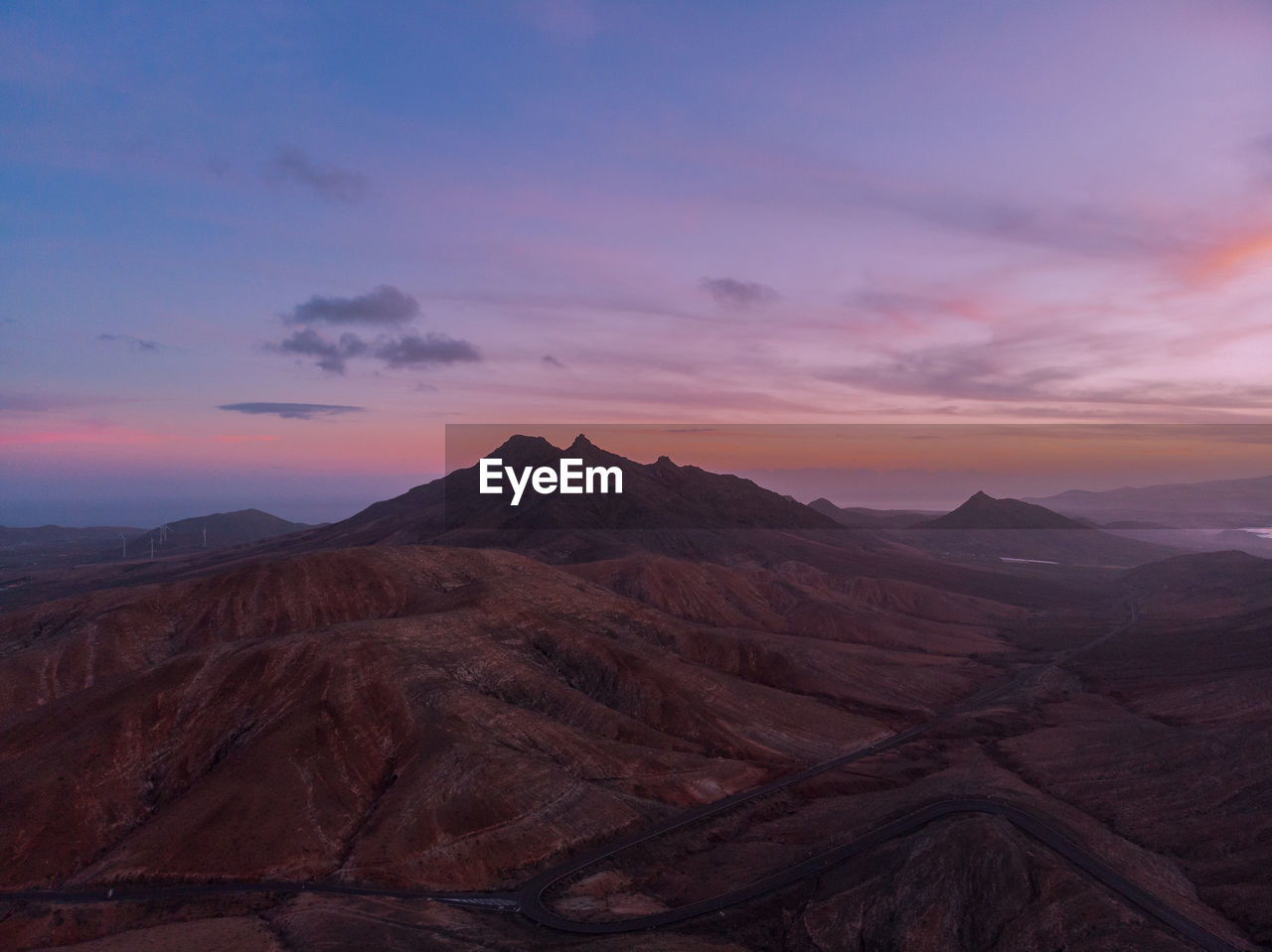 Scenic view of mountains during sunset