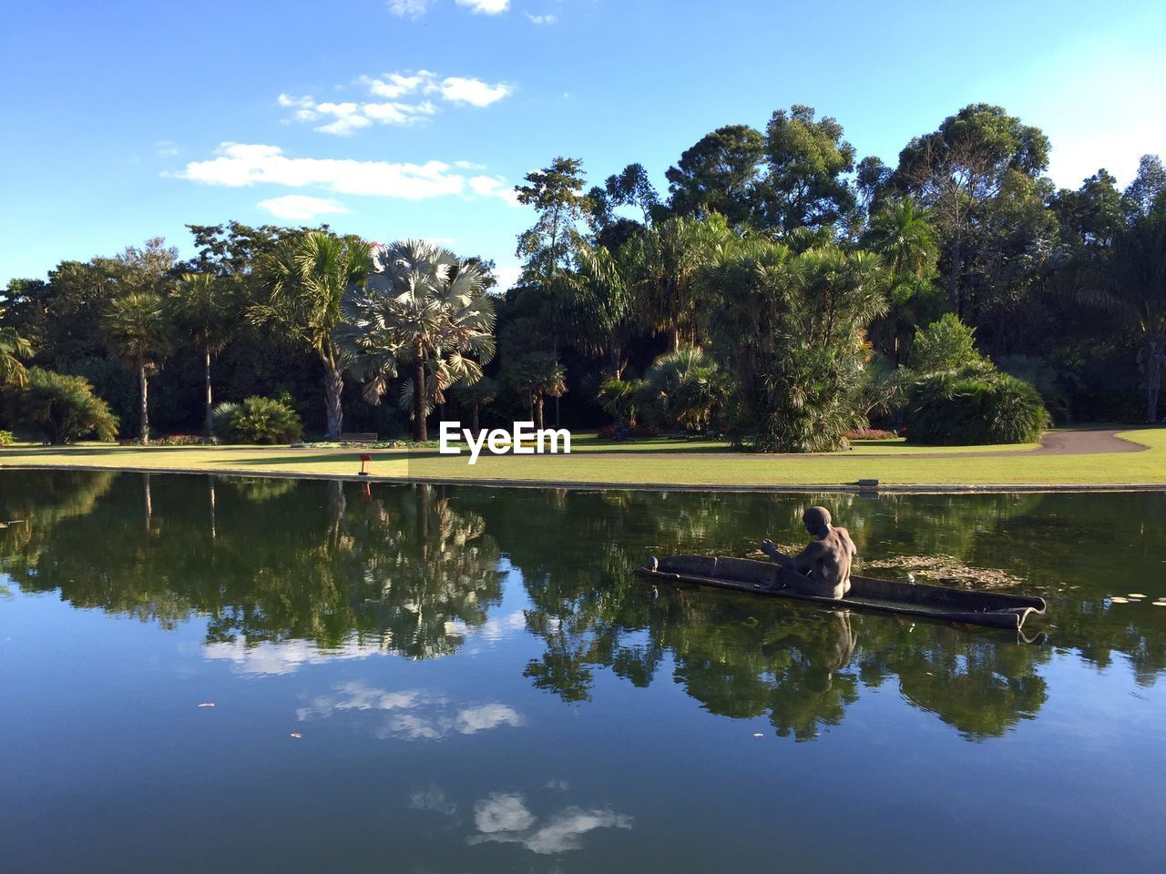 Scenic view of reflection lake by trees against sky