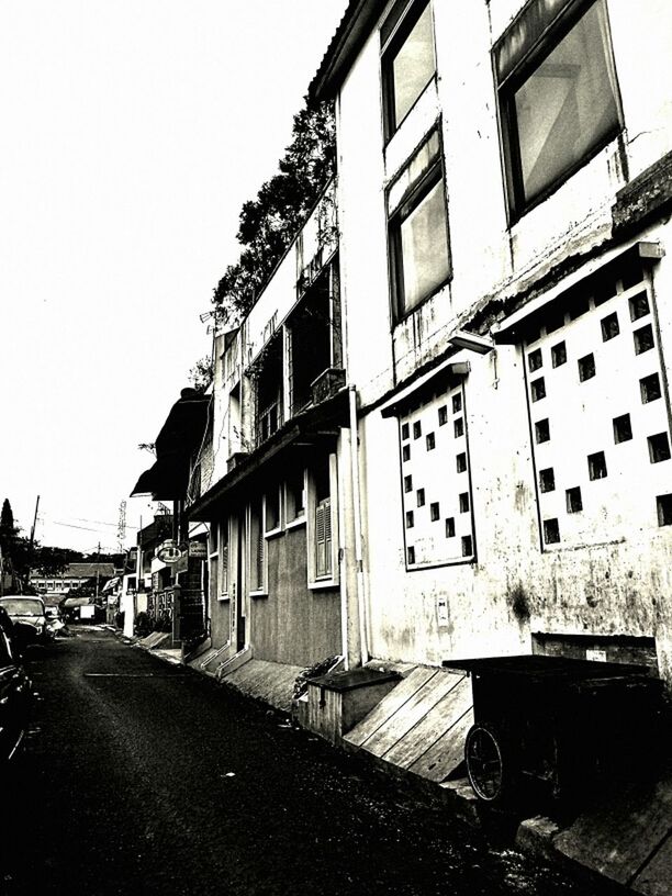 ROAD LEADING TOWARDS BUILDINGS