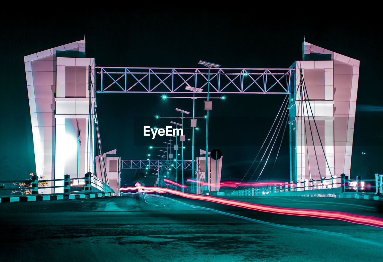 Light trails on bridge at night