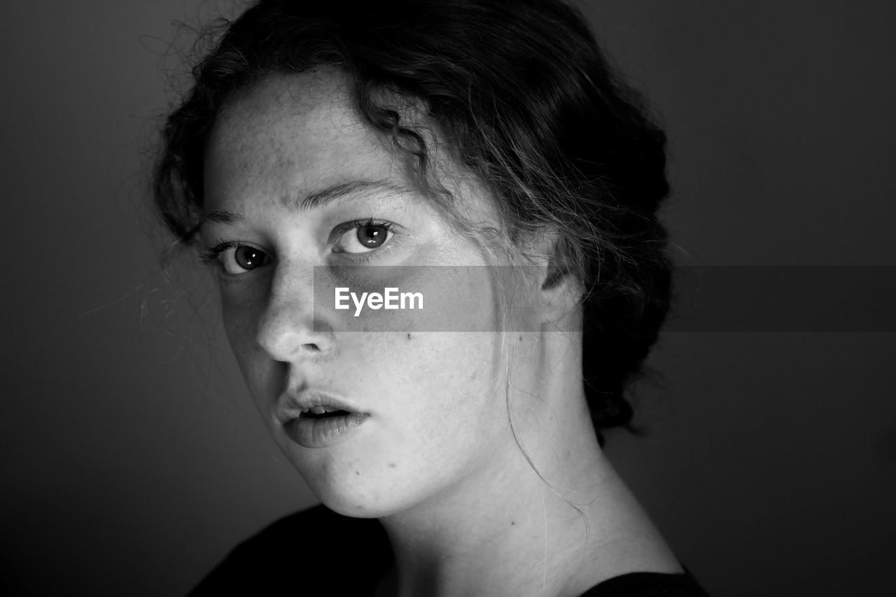 Close-up portrait of young woman