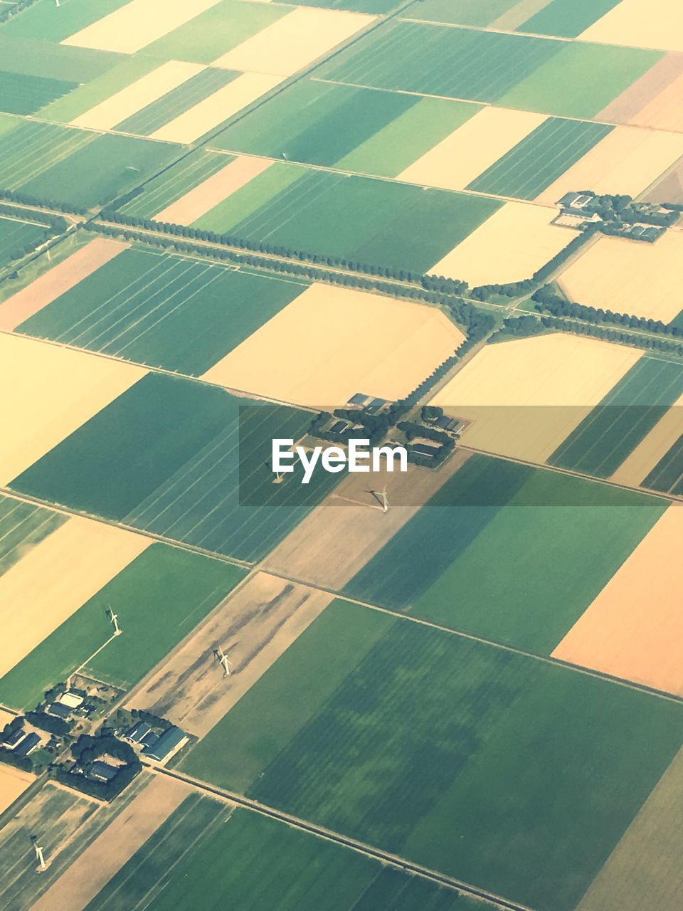 HIGH ANGLE VIEW OF AGRICULTURAL FIELD AGAINST SKY