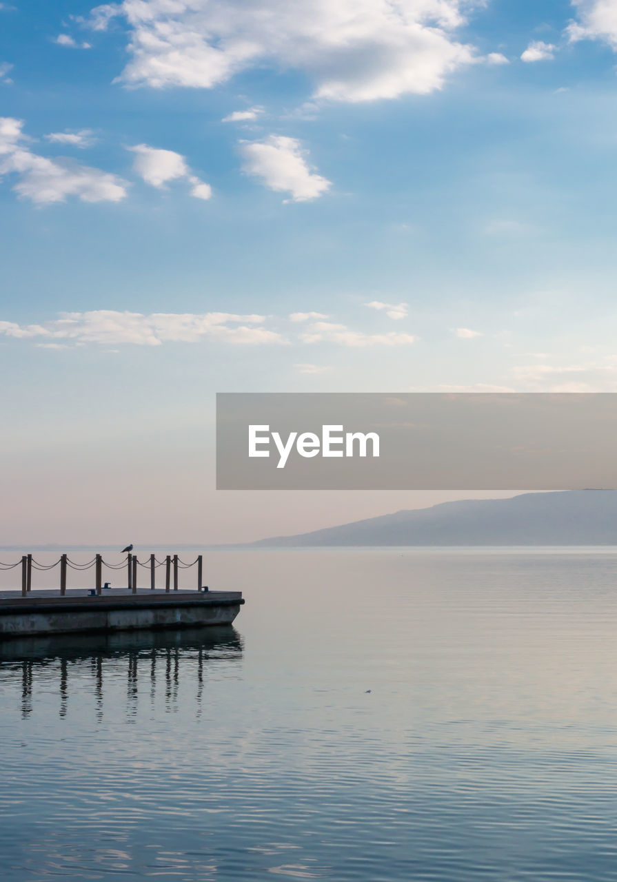 PIER IN SEA AGAINST SKY