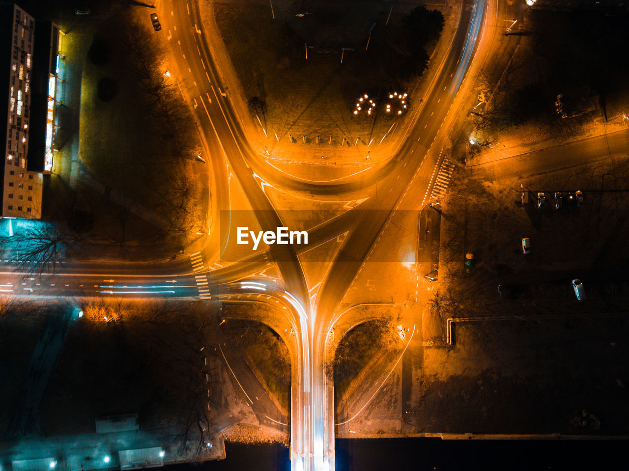 Aerial view of light trails on road in city at night