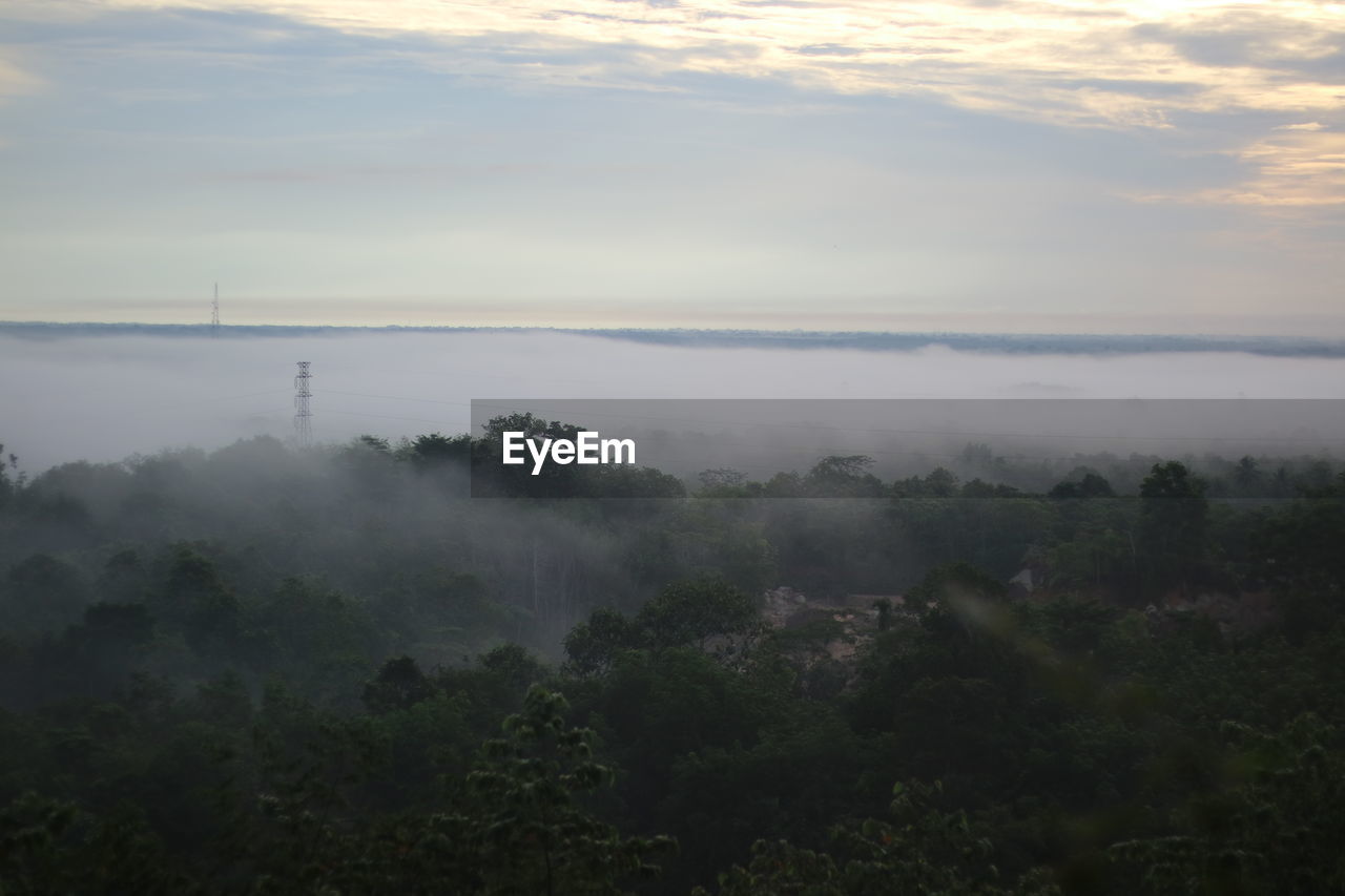 Scenic view of landscape against sky during sunset