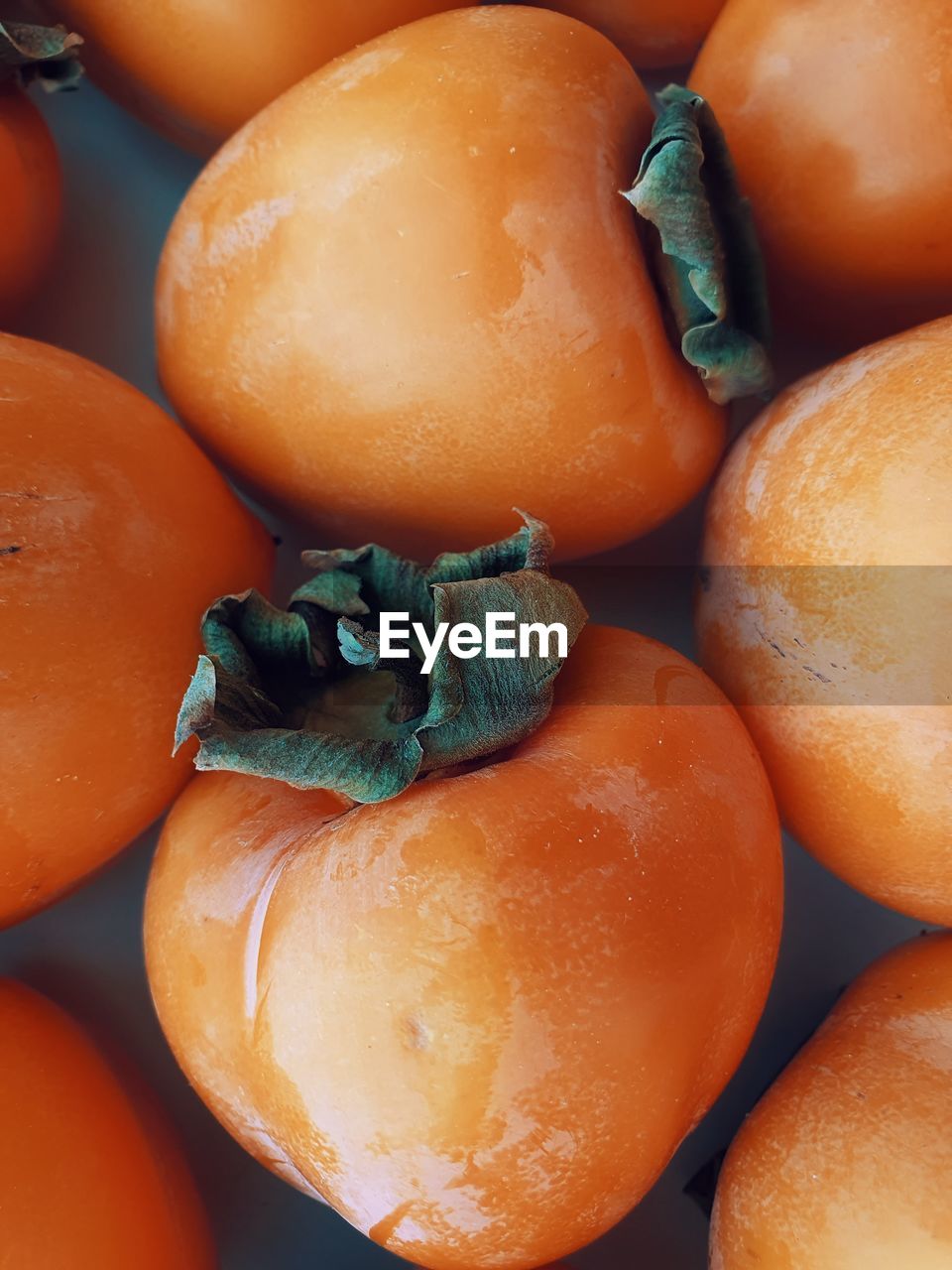 Persimmon close-up. ripe fresh persimmon.