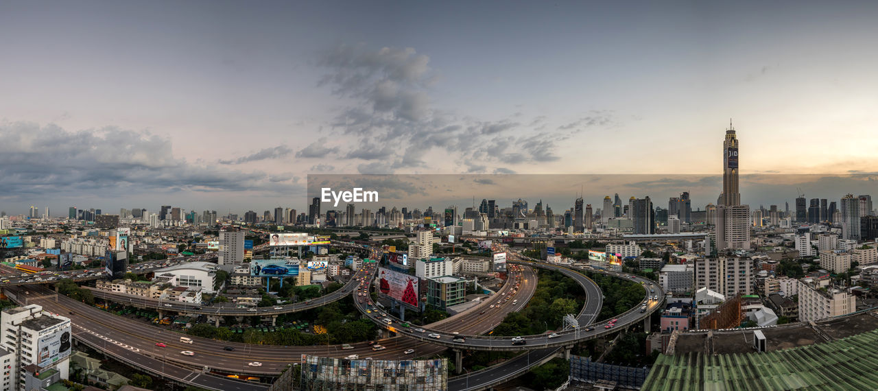 HIGH ANGLE VIEW OF CITY BUILDINGS AGAINST SKY