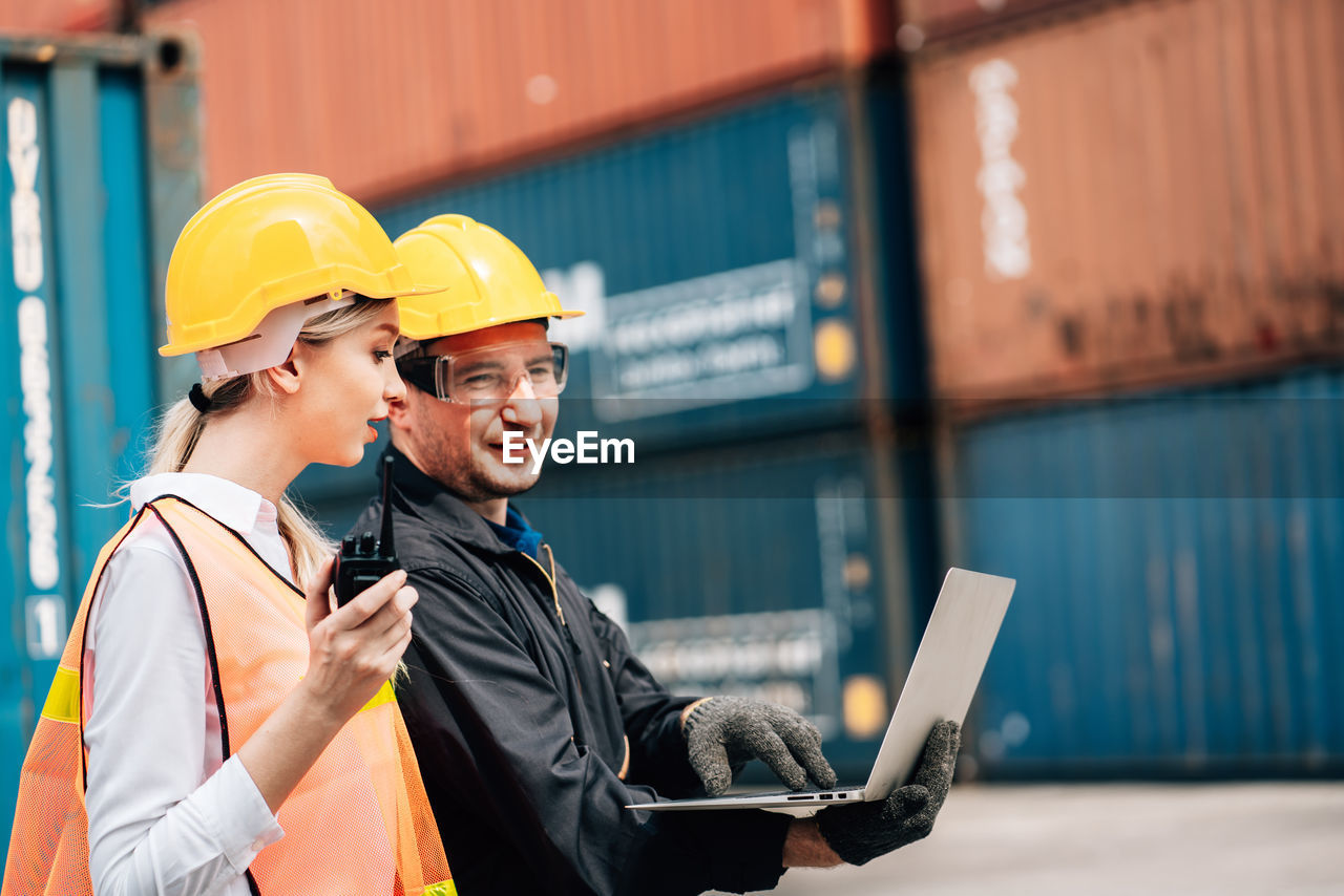 MAN WORKING WITH LAPTOP