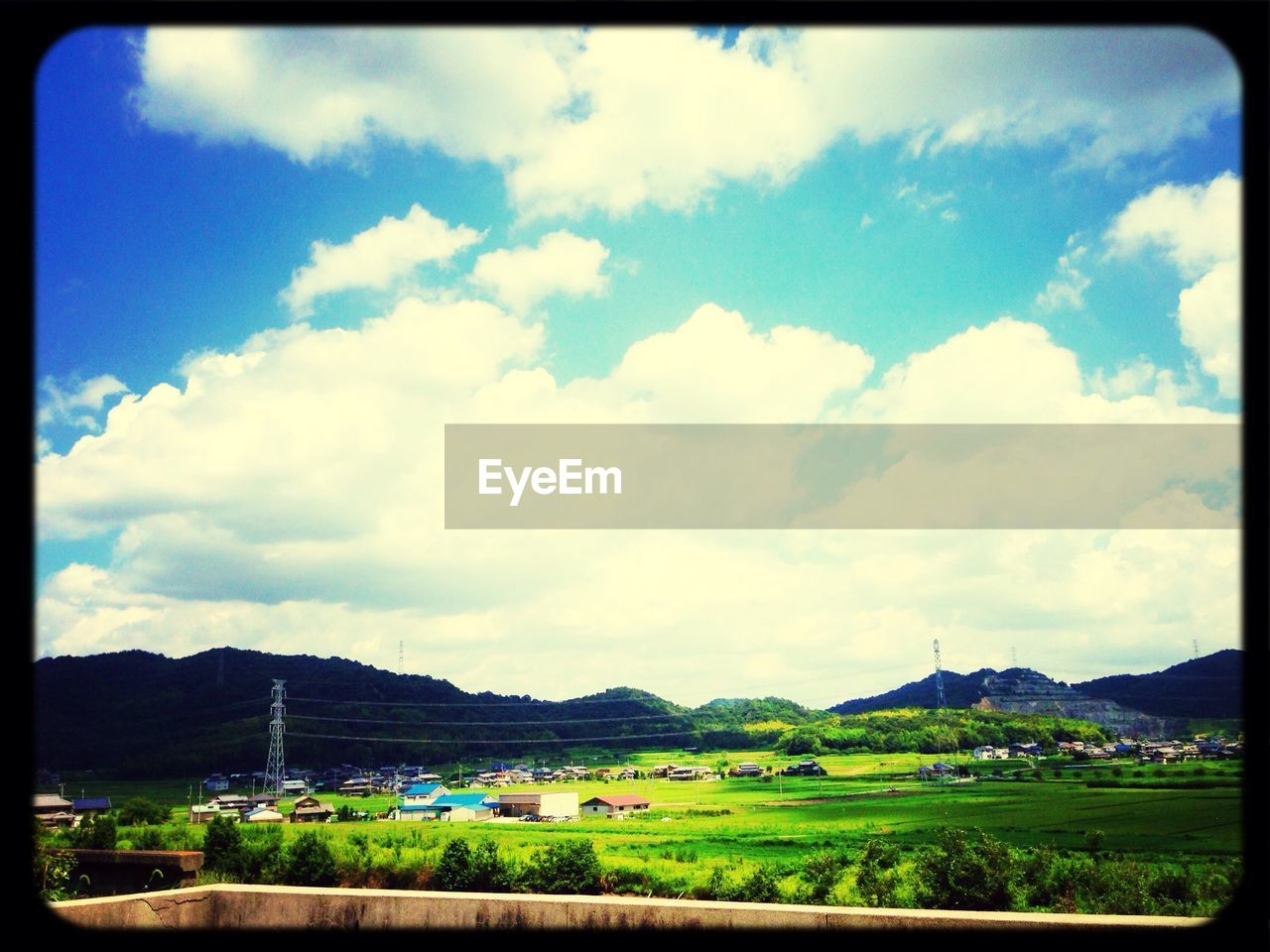 VIEW OF LANDSCAPE AGAINST CLOUDY SKY