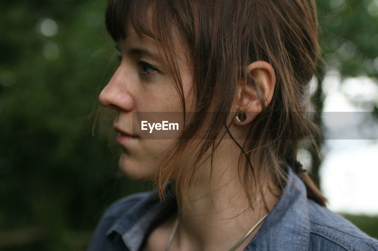 Close-up of thoughtful woman looking away