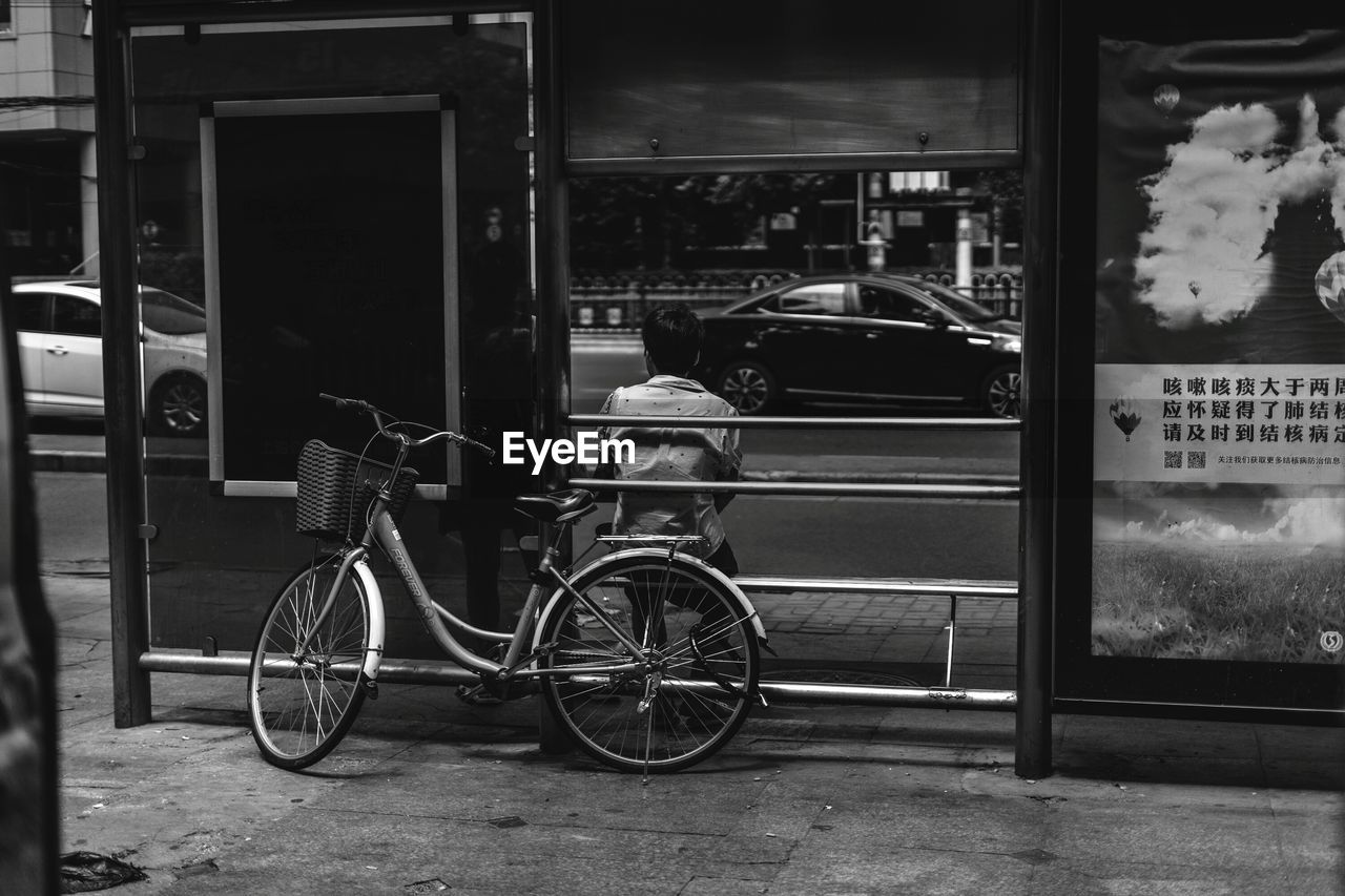 BICYCLE PARKED ON STORE
