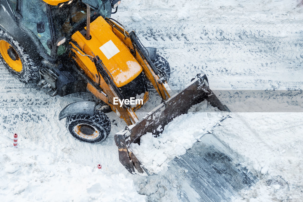 high angle view of snow covered car