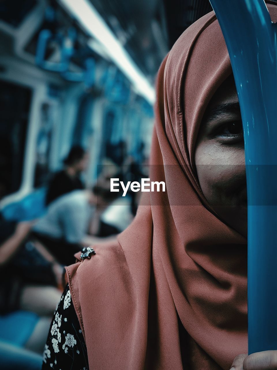 Close-up portrait of young woman in hijab