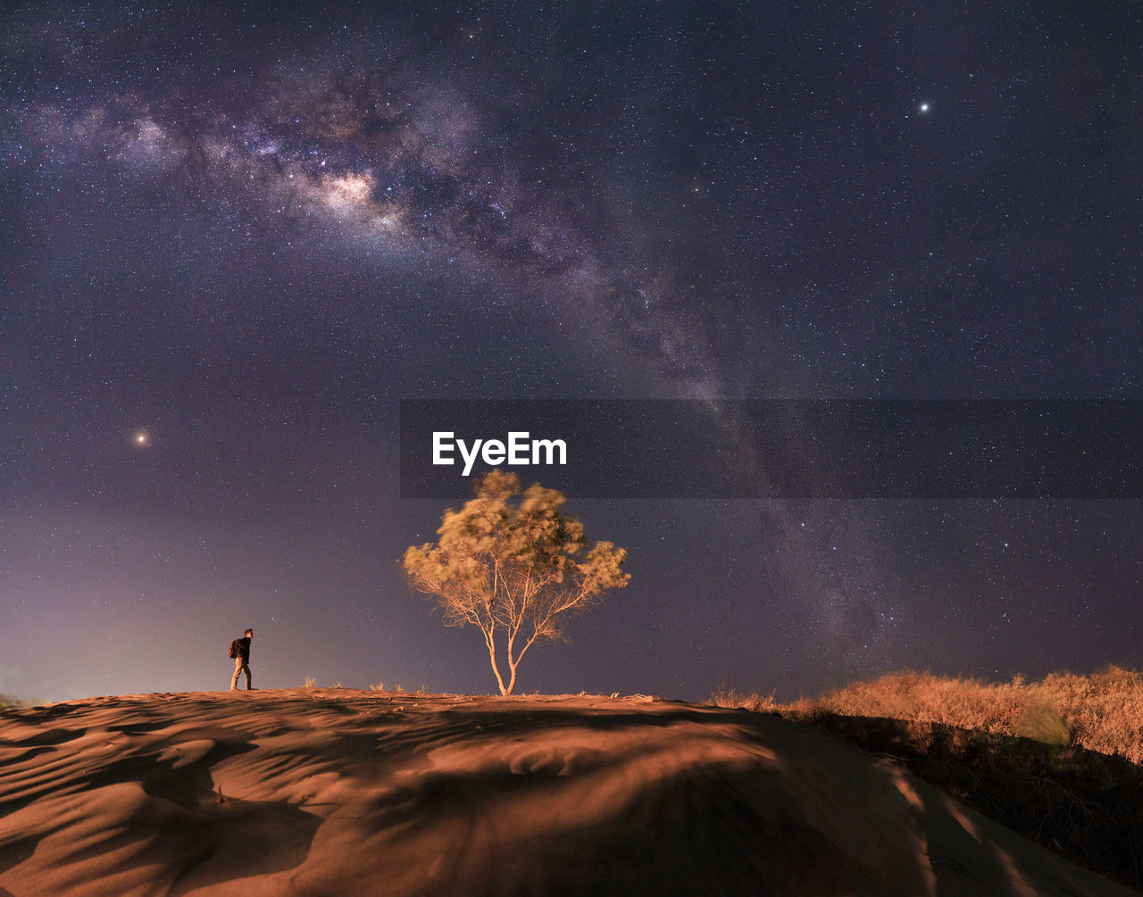 Scenic view of star field against sky at night