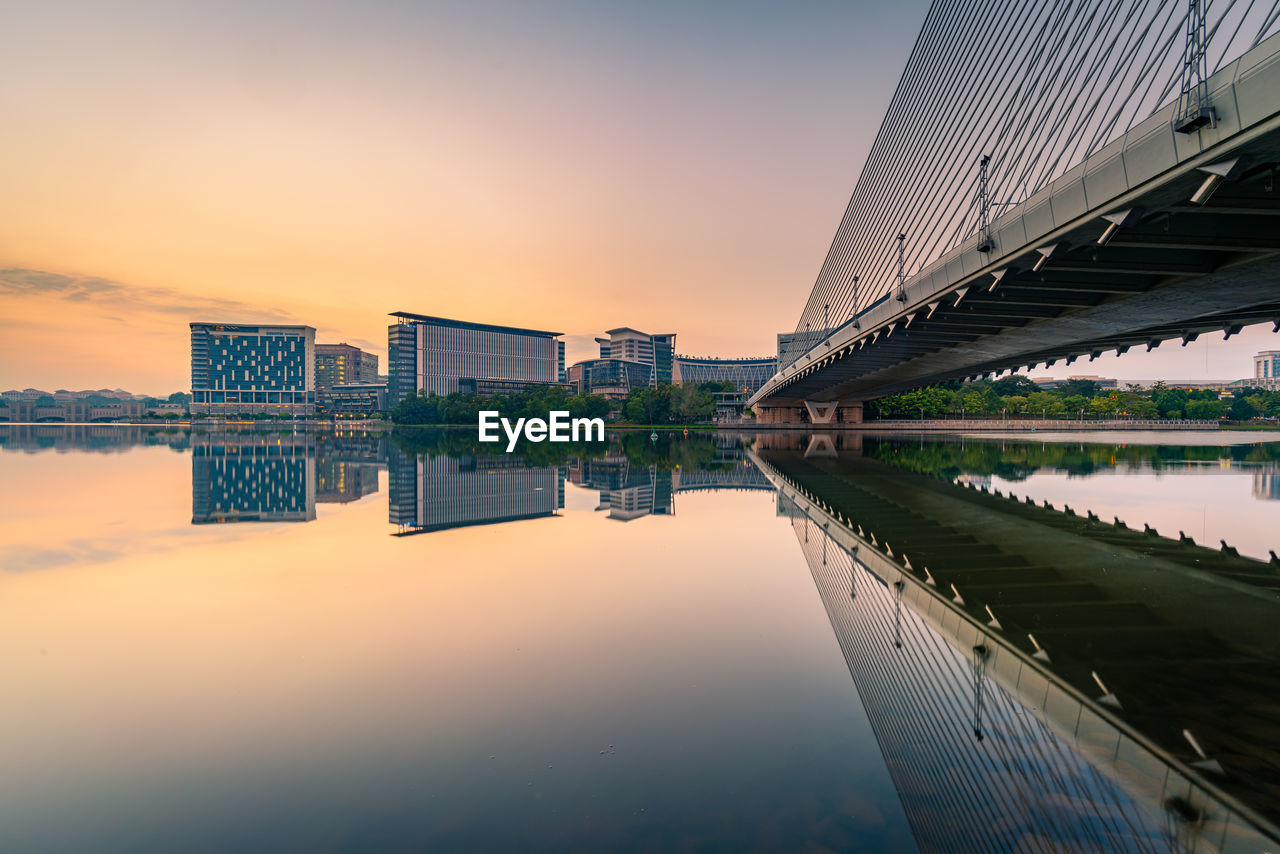 VIEW OF BRIDGE OVER RIVER AGAINST SKY