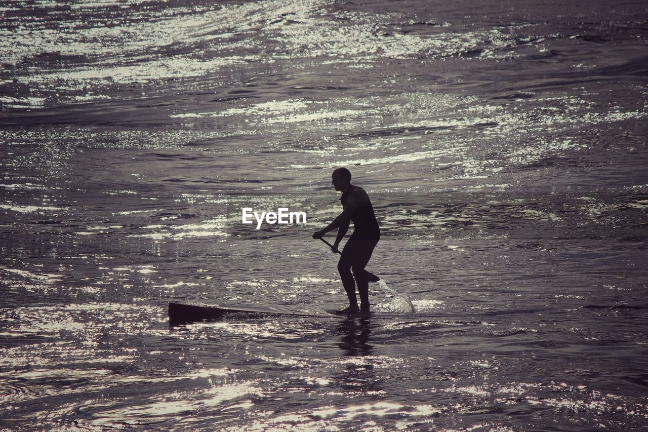 VIEW OF PEOPLE ON BEACH