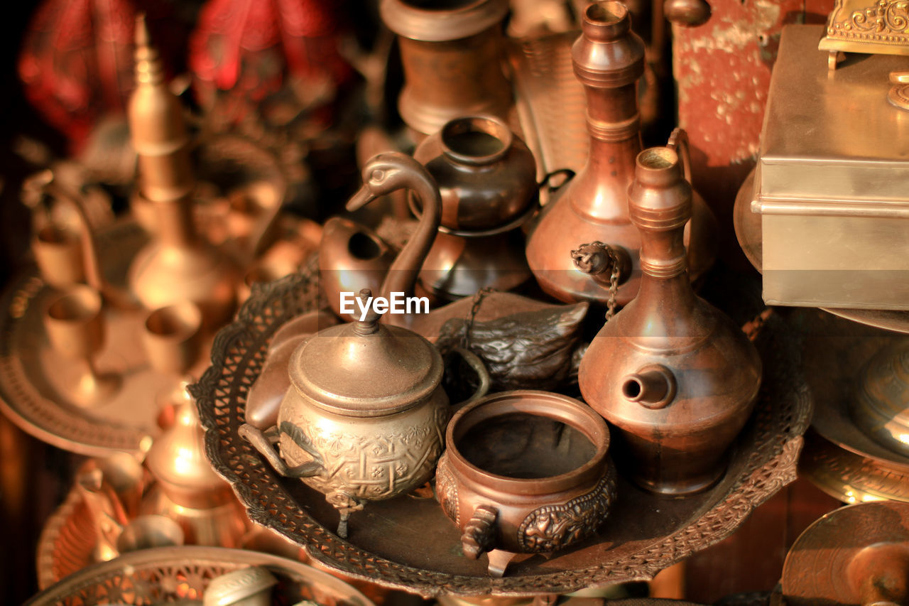 High angle view of antique objects for sale
