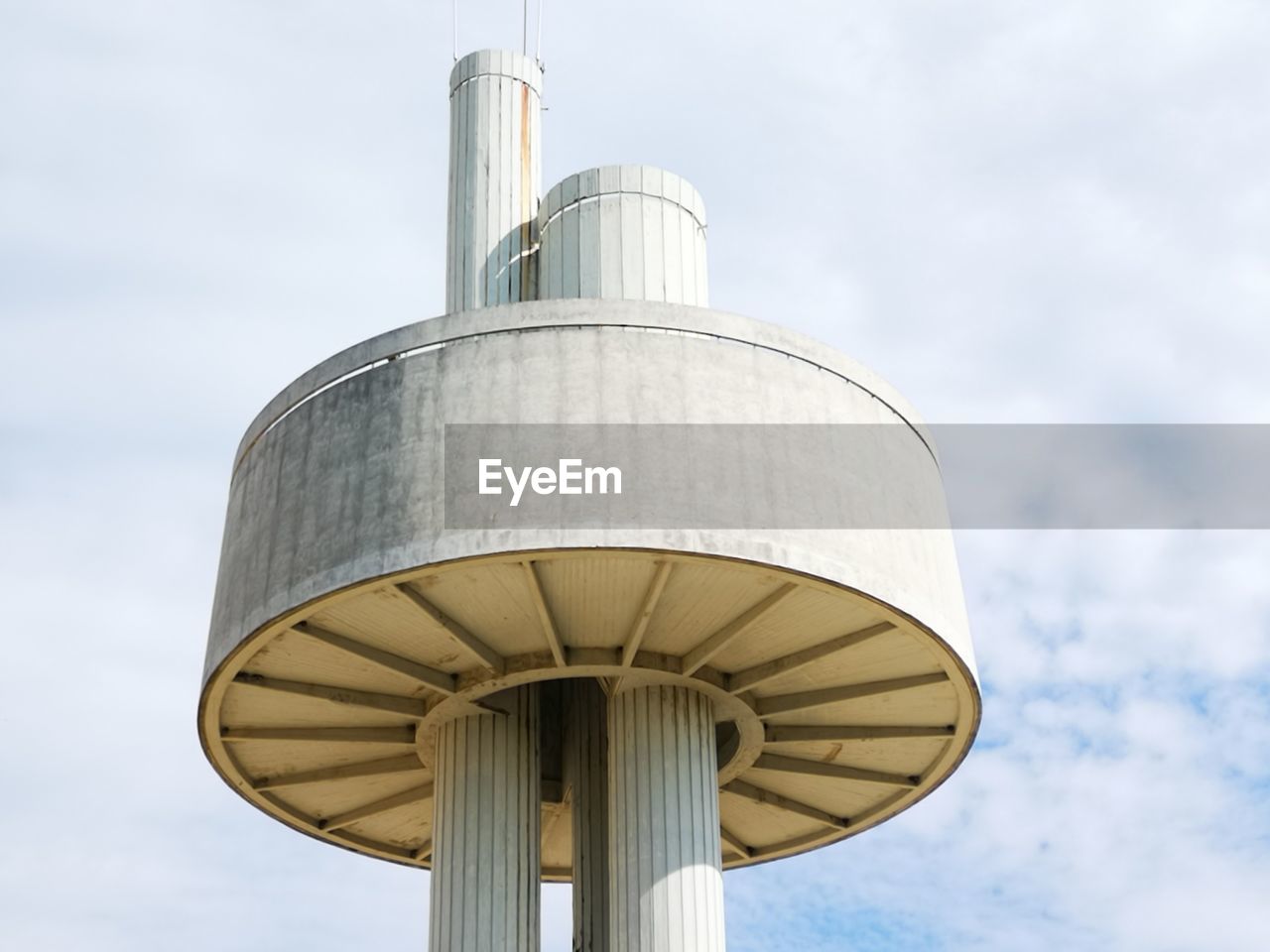 Low angle view of water tower against sky