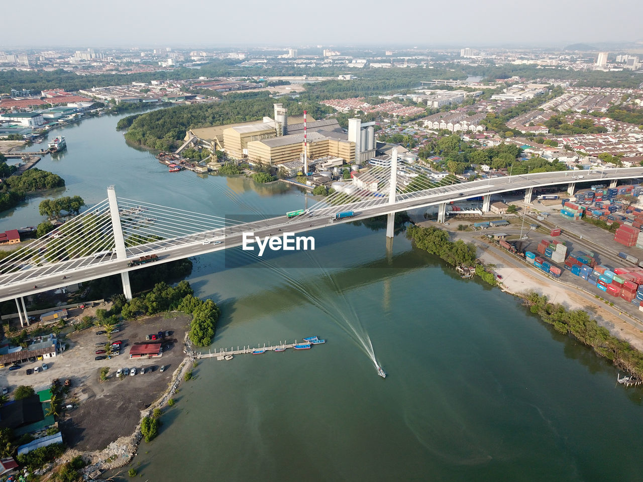 A boat cross perai river bridge.