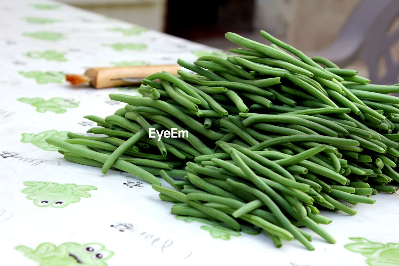 High angle view of green beans on table