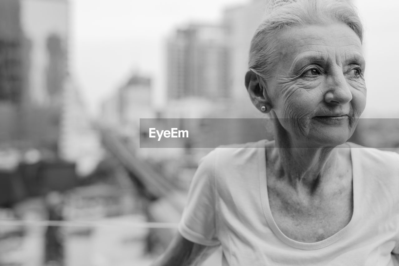 Senior woman looking away outdoors