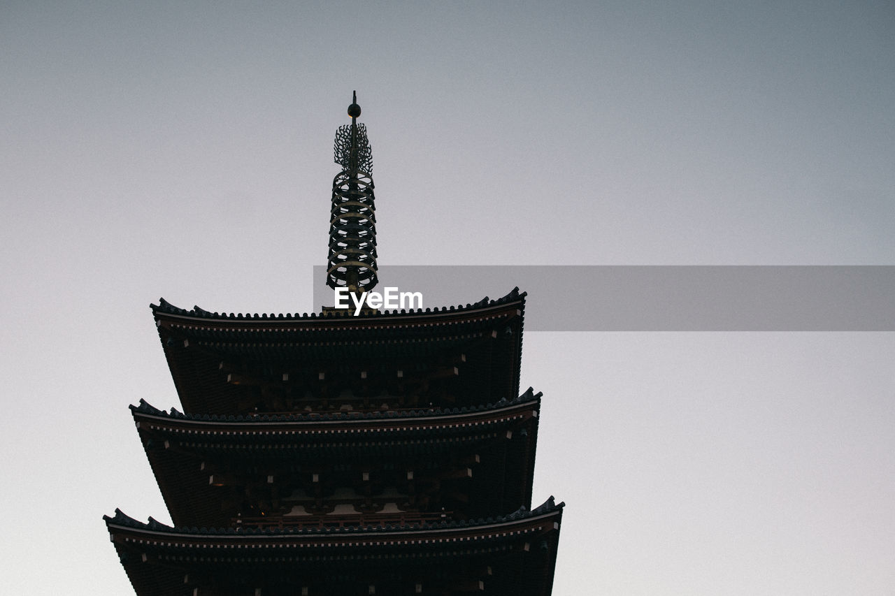 Low angle view of traditional building against sky