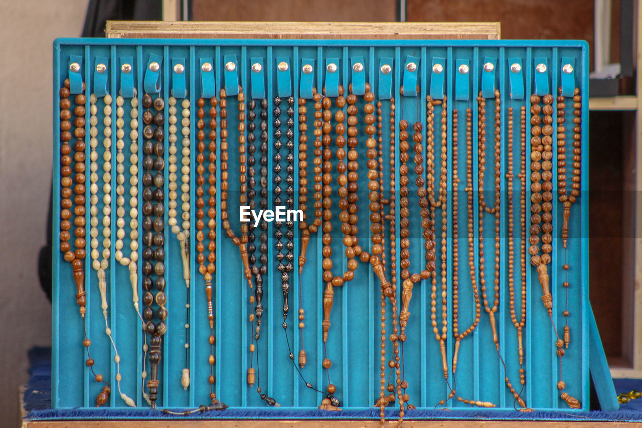 Close-up of praying beads in row