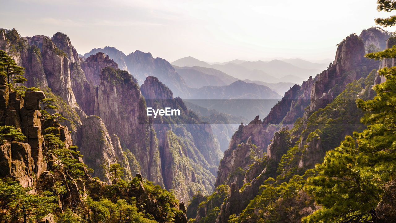 Scenic view of mountain ranges against sky