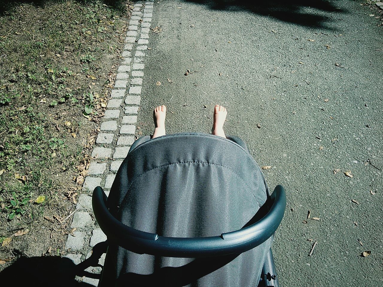 High angle view of baby carriage on street