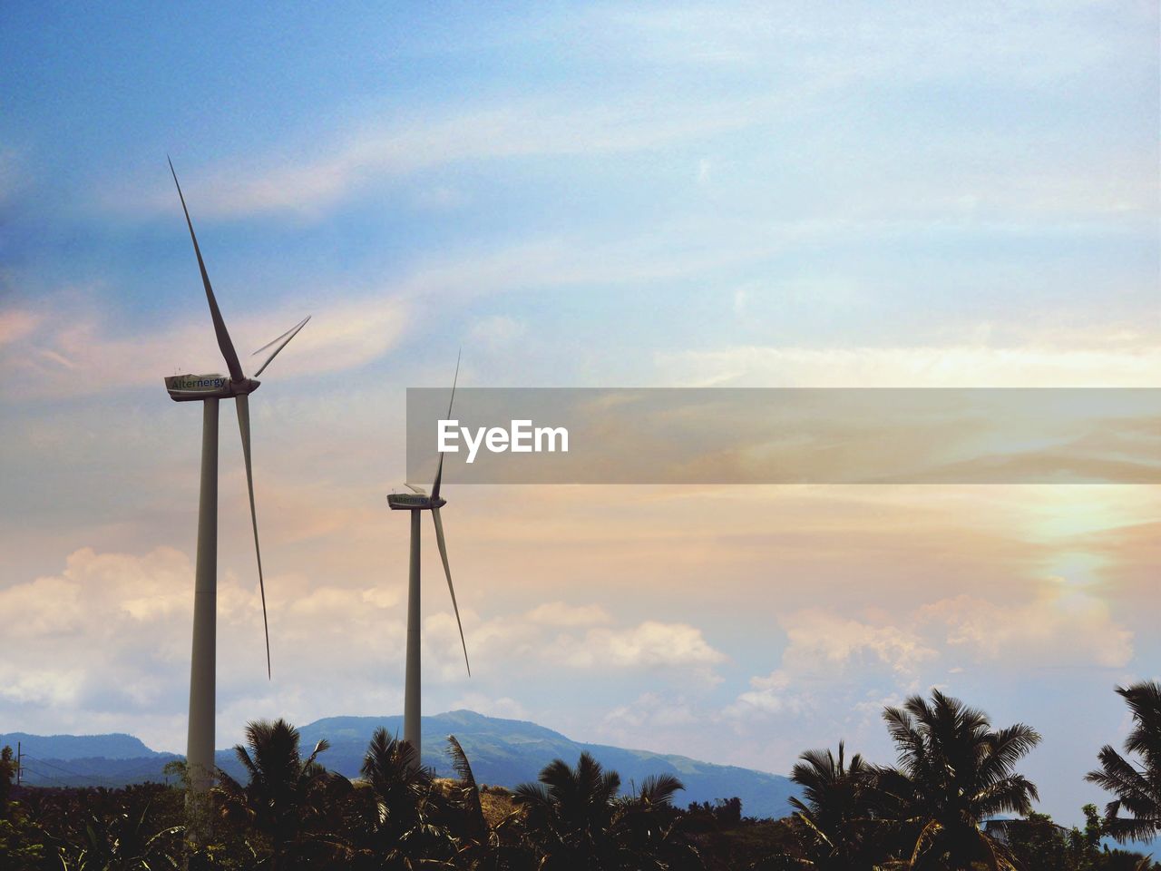 LOW ANGLE VIEW OF TRADITIONAL WINDMILL AGAINST SKY