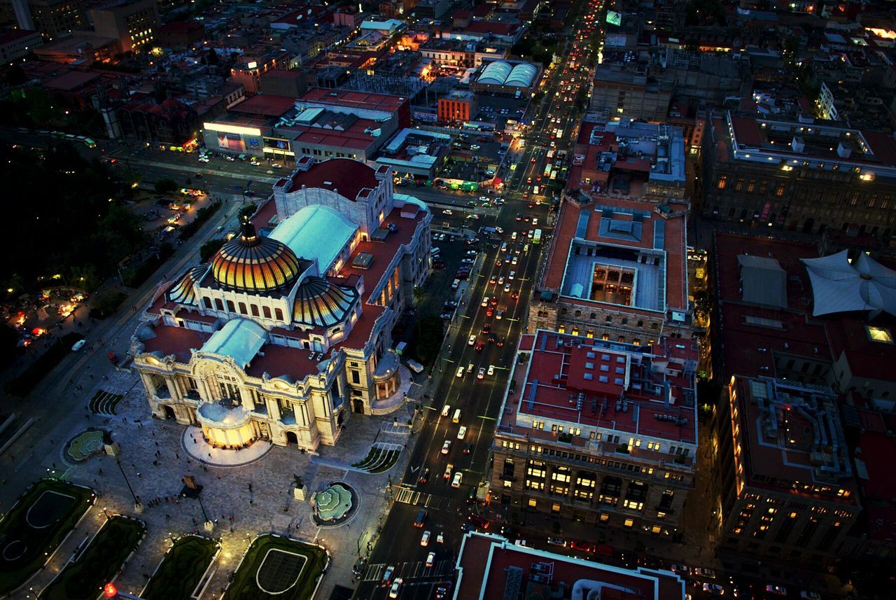 High angle view of illuminated palacio de bellas artes in city at night