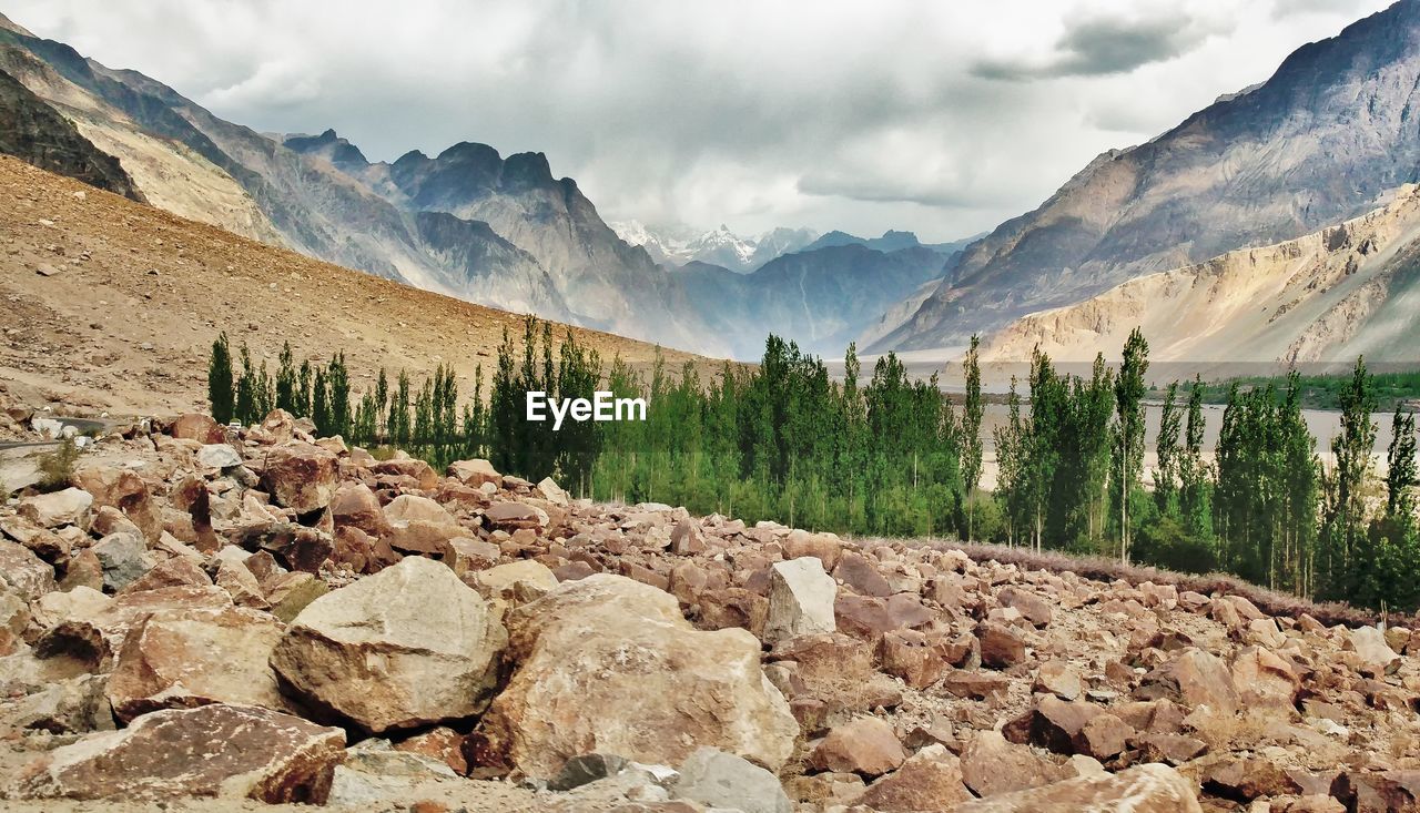 Scenic view of rocky mountains against sky