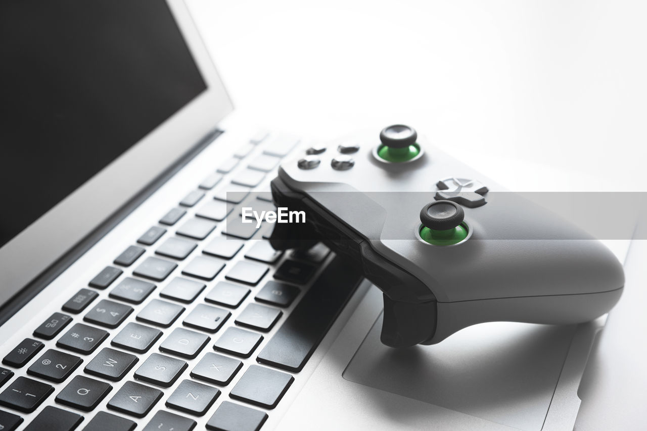 CLOSE-UP OF LAPTOP ON TABLE