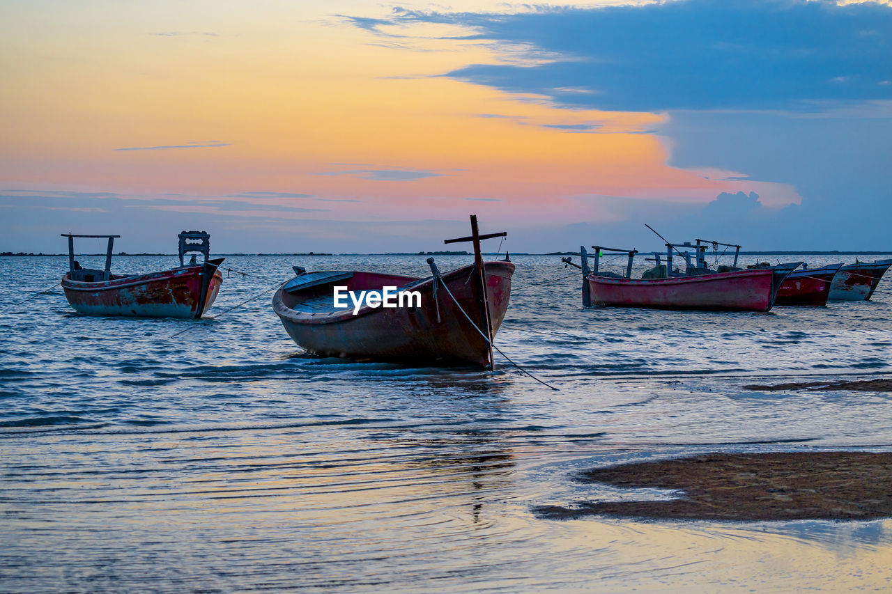 Sunset view with cloudy sky at gadani beach with dhow boat