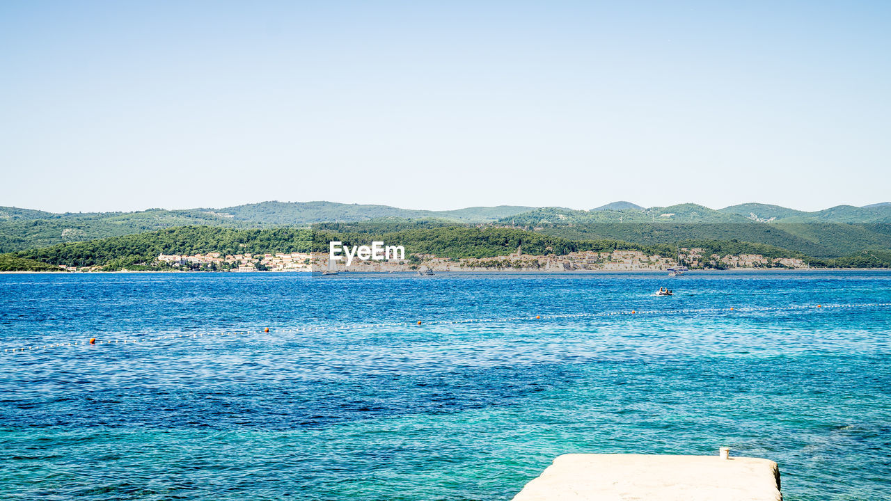 Scenic view of sea against clear sky