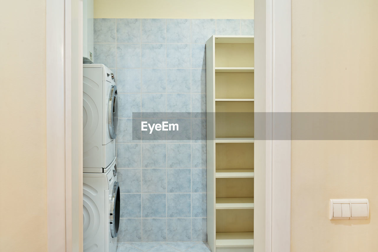 Utility room in the house for laundry and storage.