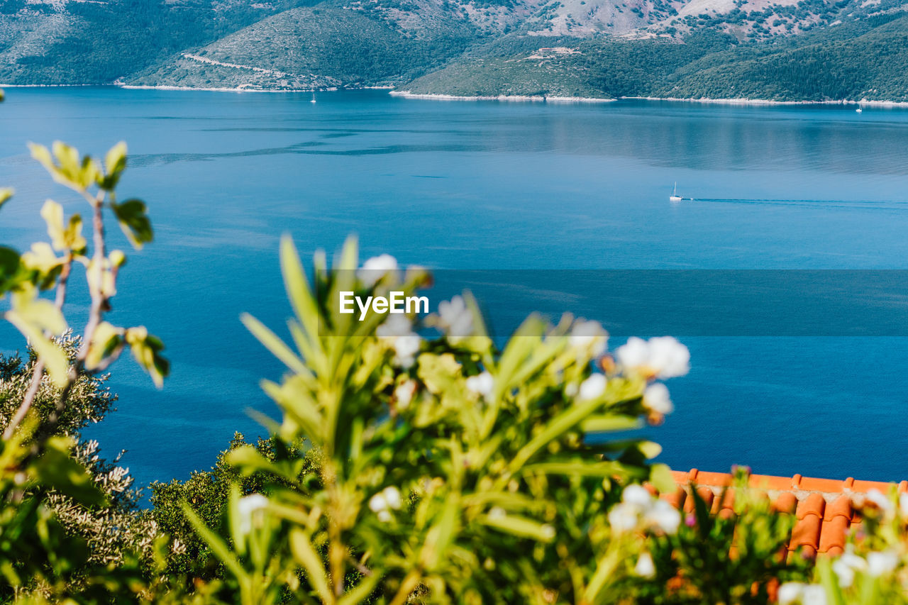 Scenic view of sea and mountains